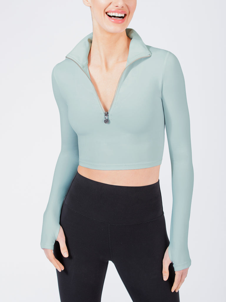 ATHLETICS HALF ZIPPER TOP, OASIS