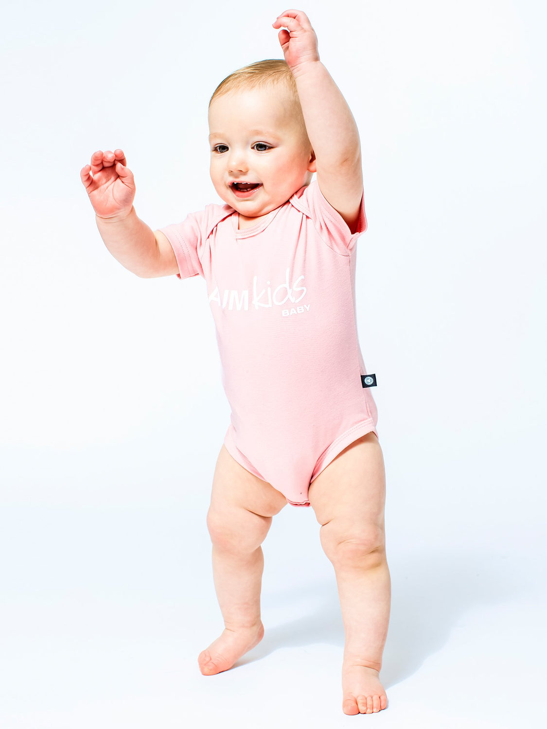 AUMkids HAPPY BABY SHORT SLEEVE ONESIE + BIB SET, PINK